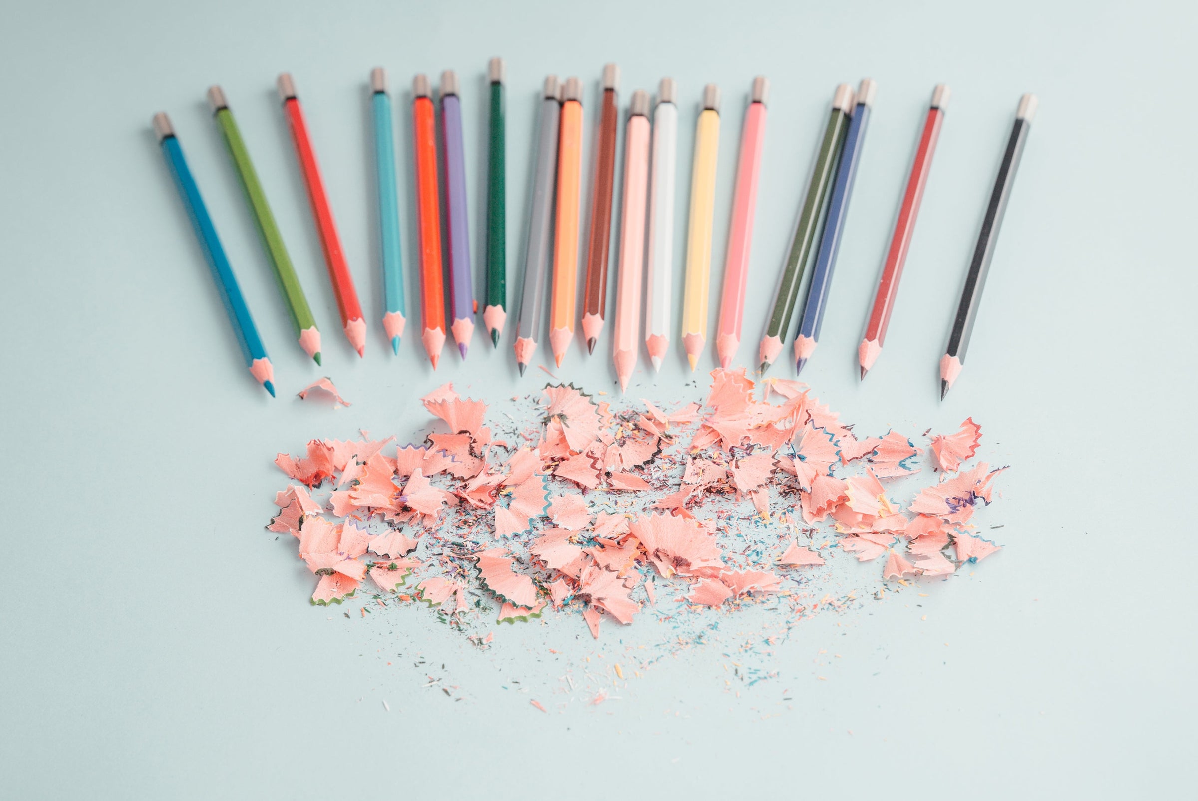 Pencils lined up with shavings